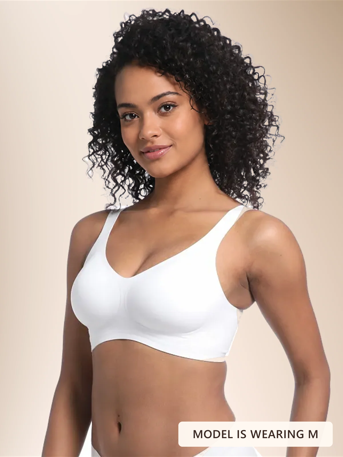 Model wearing the Faveno Jelly Bra in White, size M. Image label: Model is wearing M.