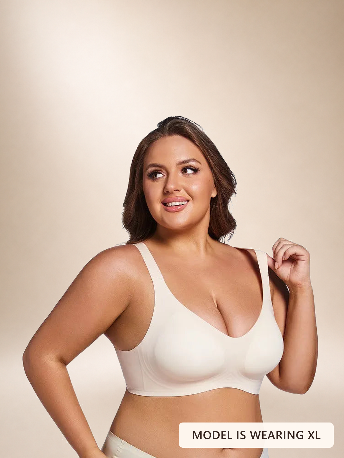 Three-quarter view of a model wearing the Faveno Jelly Bra in Light Nude, size XL. Image label: Model is wearing XL.